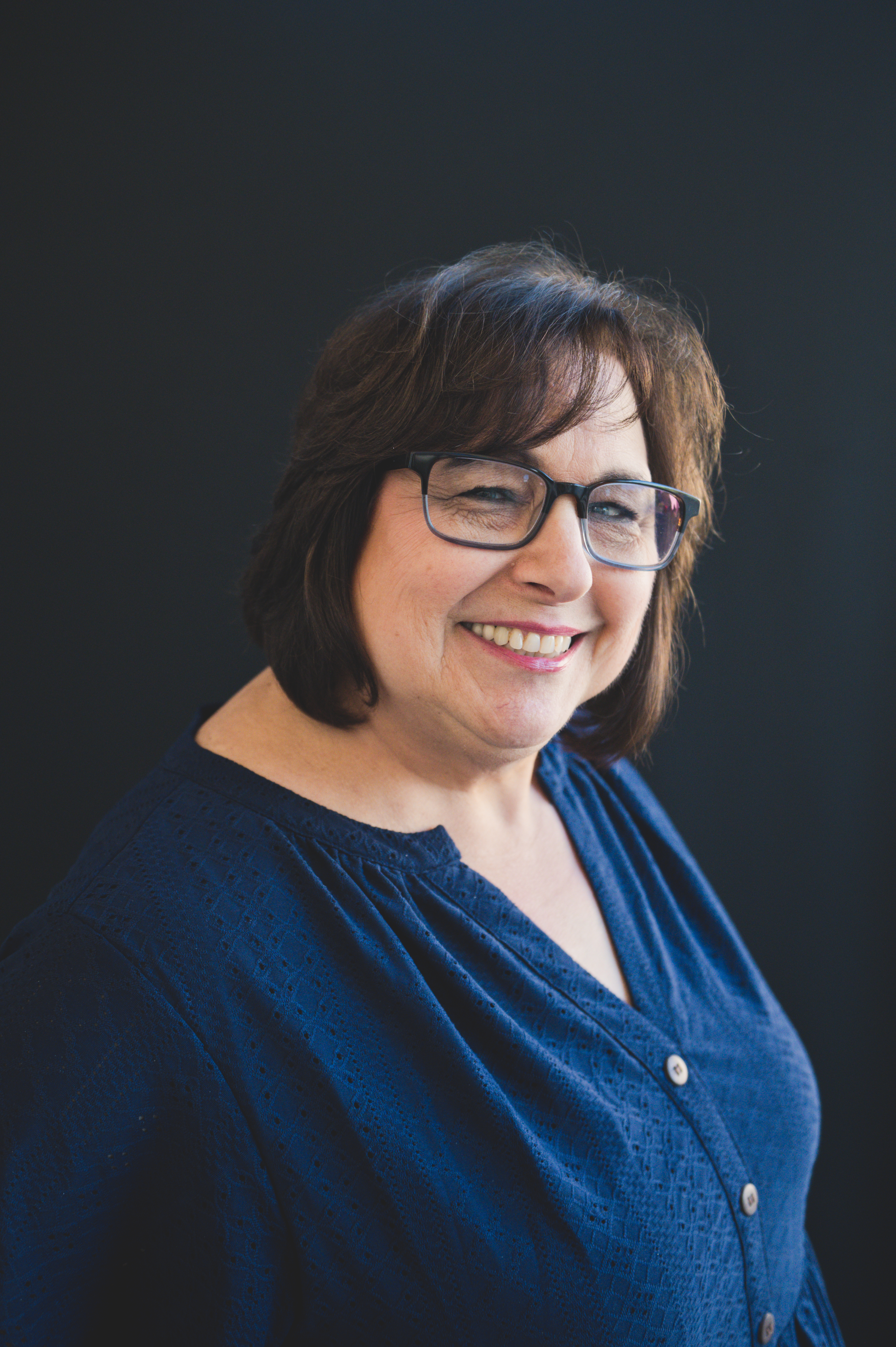 Mrs. Joan Holder